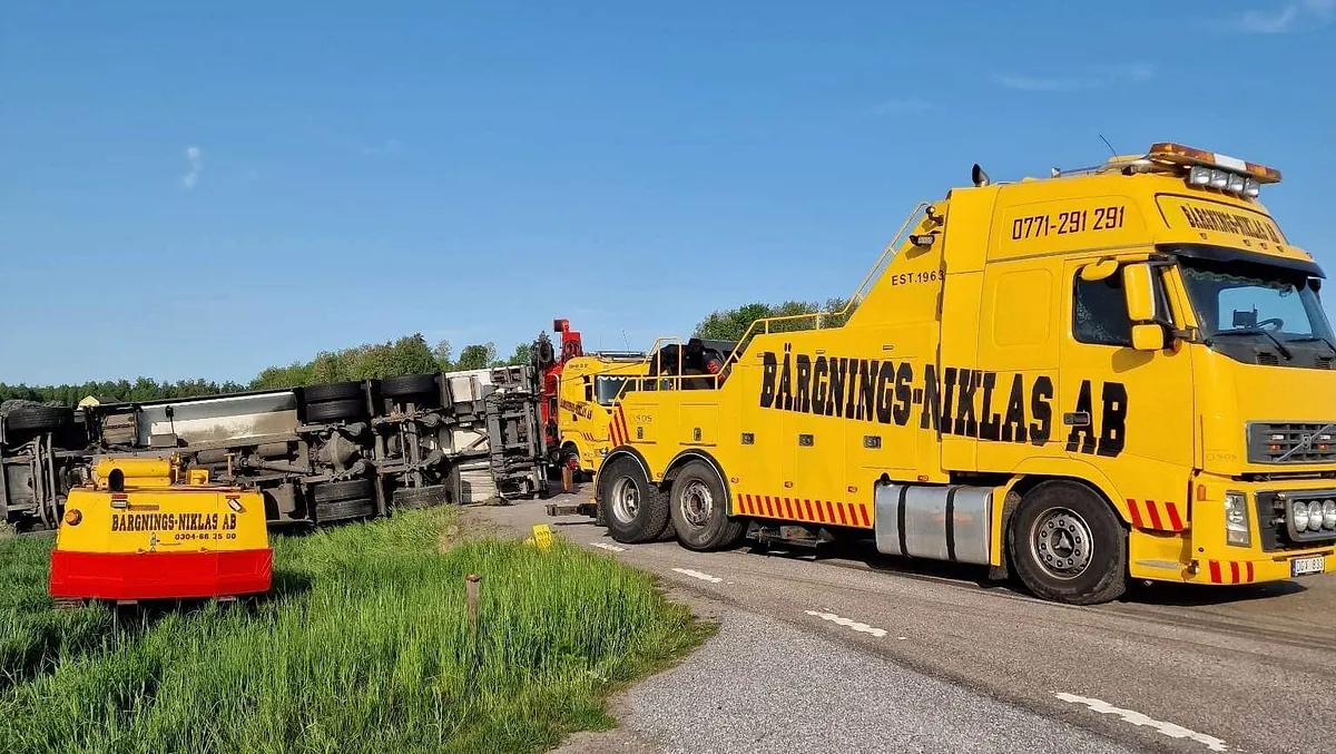 tungbärgare, lastbil vält
